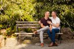 Kyler and Aaron gay engagement photo shoot- couple sitting on a park bench