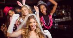 Friends celebrating bachelorette party in a nightclub