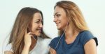 Lesbian couple listening to music together