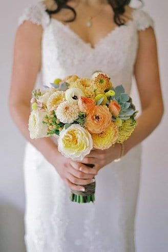 A beautiful bouquet made of round white, pink and green flowers