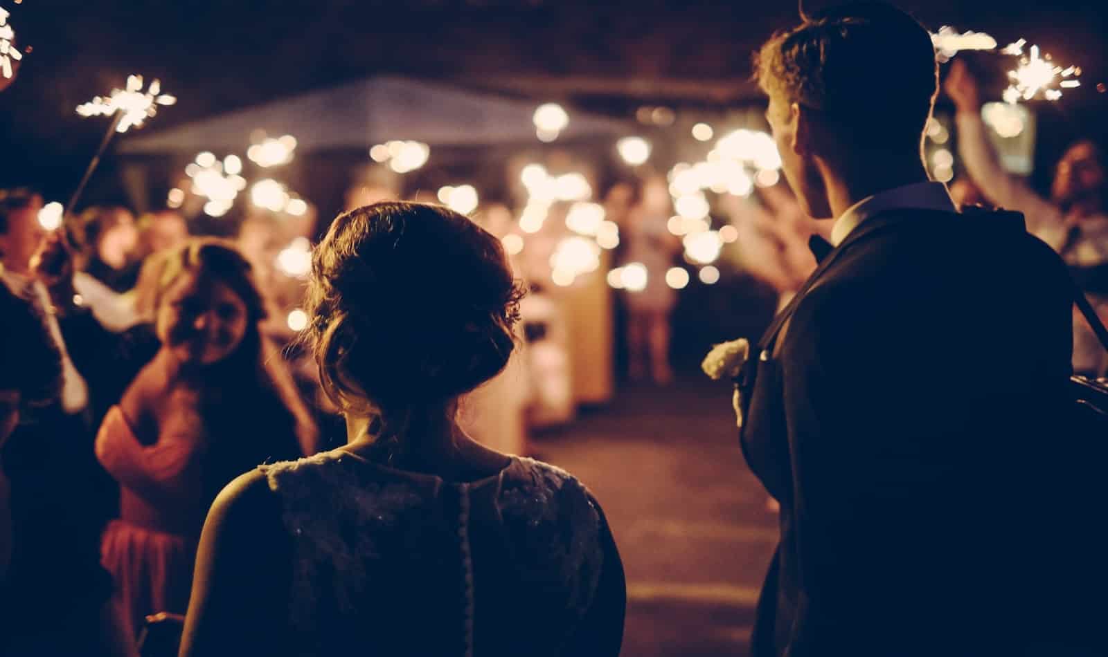 bride and groom celebrating after a surprise wedding
