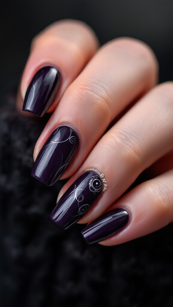 Close-up of dark purple nails with silver swirl designs