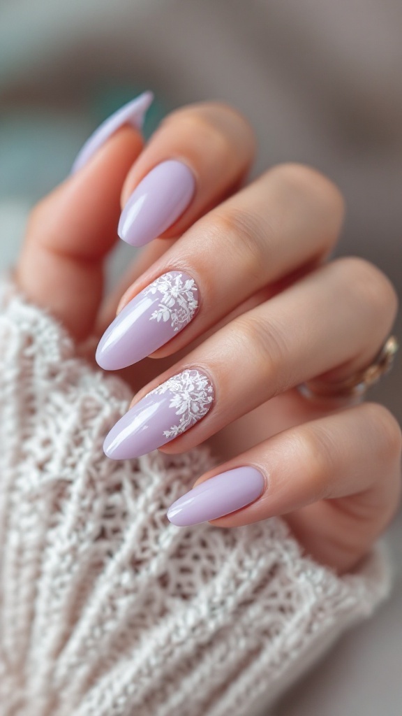 Lavender nails with white lace design on a hand wearing a textured sweater