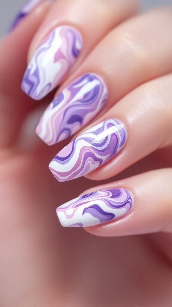 Lavender marble nail design with floral accents.
