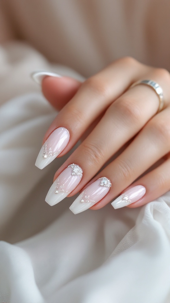 Bridal nails featuring a mix of pearl and rhinestone embellishments in an Art Deco inspired design.