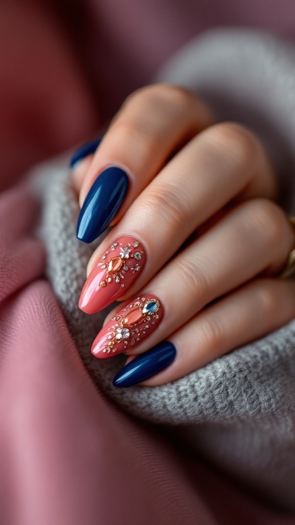 A close-up of hands with bold jewel-toned nails, featuring deep blue and vibrant pink colors with sparkling decorations.