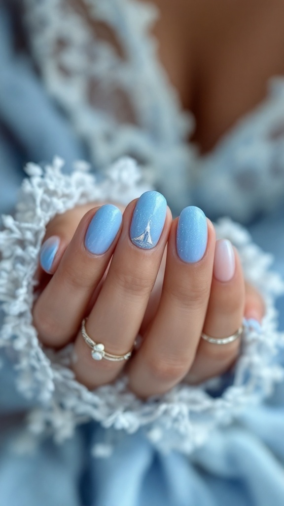 Cinderella-themed wedding nails with a blue gradient and a tiny glass slipper design.
