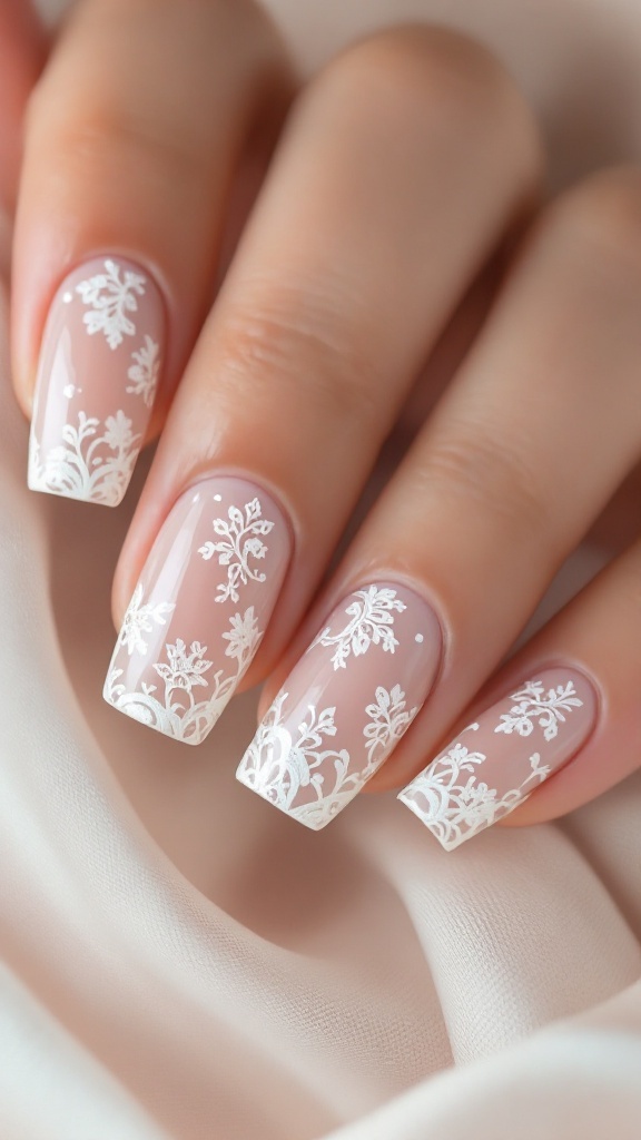 Wedding nails featuring ivory lace design over nude polish.