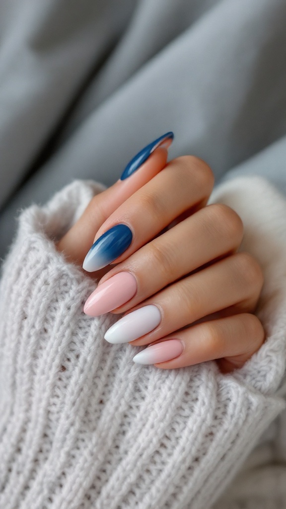 Close-up of a hand with navy blue and blush pink nails, wearing a cozy knitted sweater