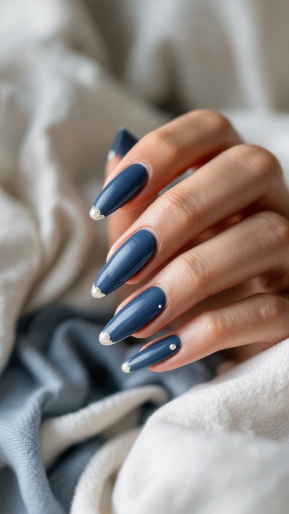 Navy blue wedding nails adorned with pearls