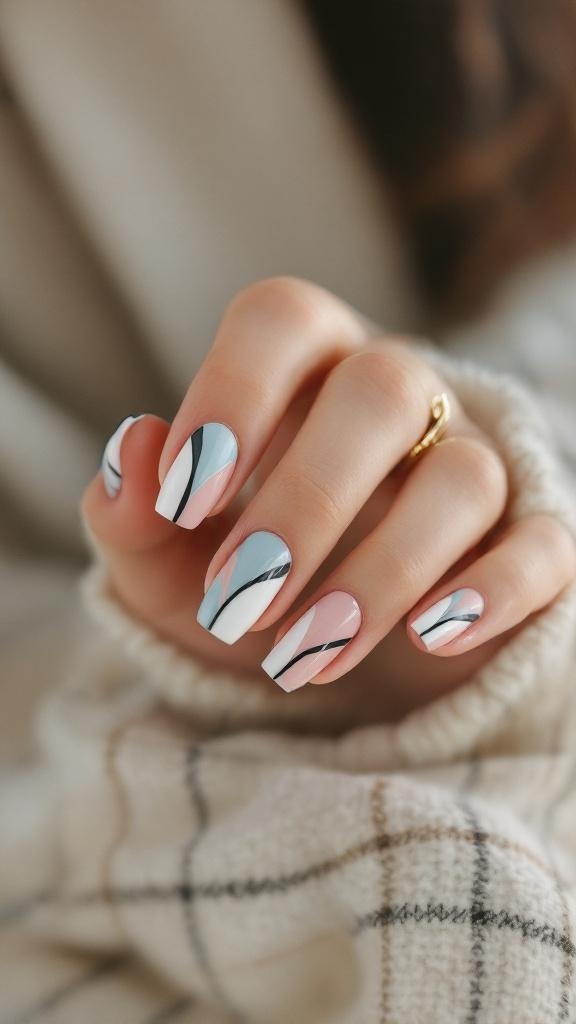 Color-blocked short nails with pastel colors and black lines