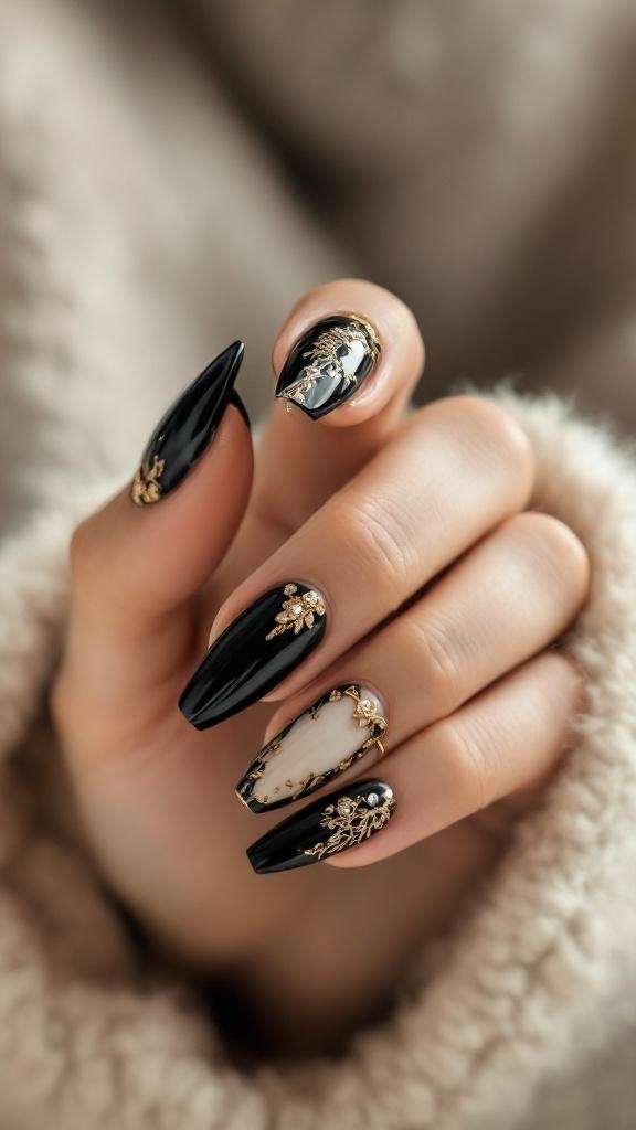 A hand with black stiletto nails featuring gold accents and a marble design.