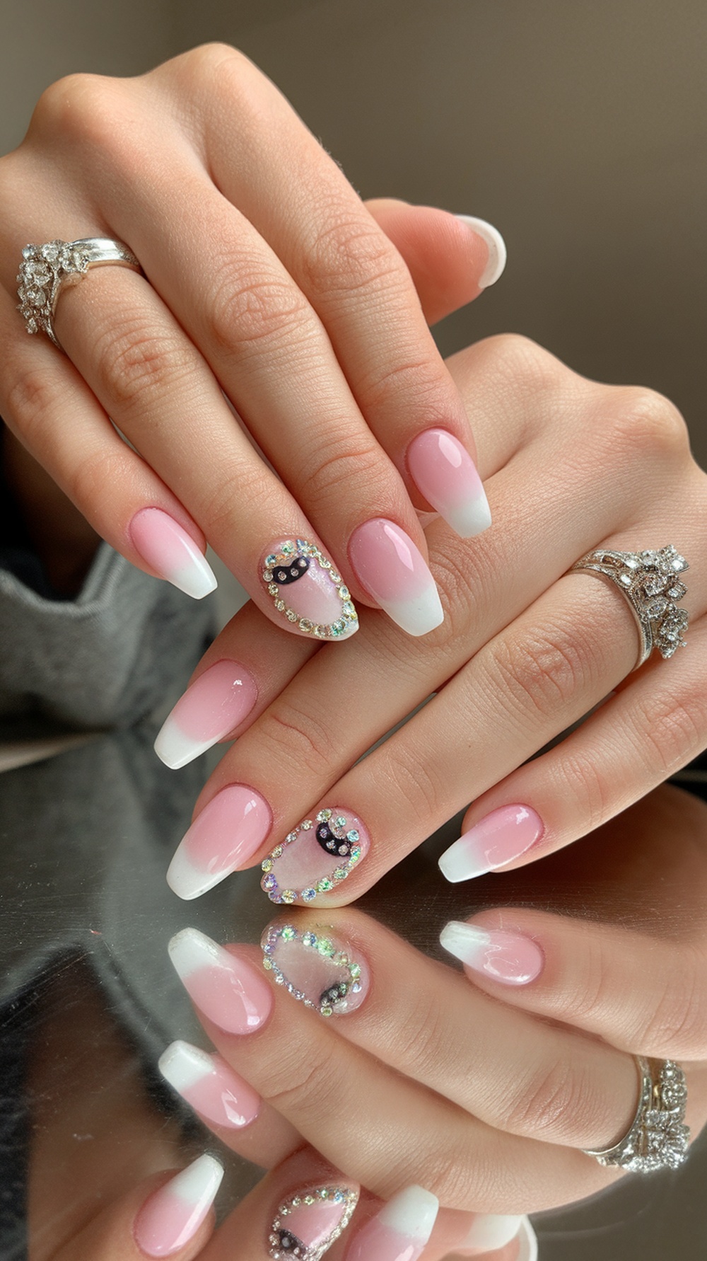 Gradient pink cat eye nails with rhinestones