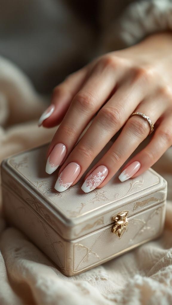 Lace-inspired French nail art with a soft pink base and white tips, featuring intricate lace designs.