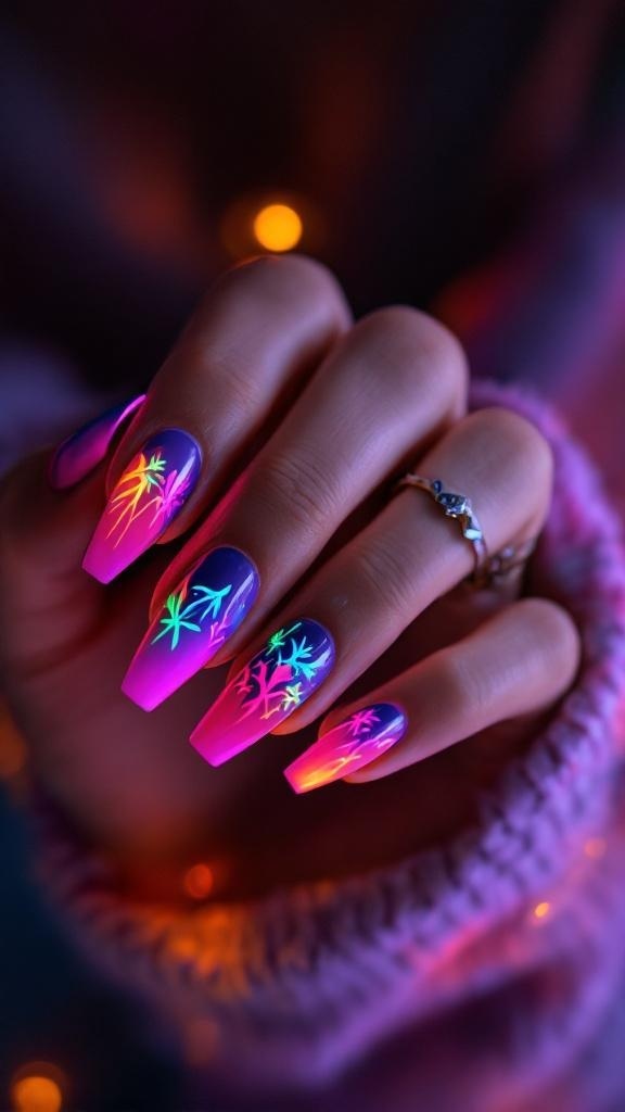 Cute short acrylic nails in neon colors with a gradient effect and tropical leaf designs.
